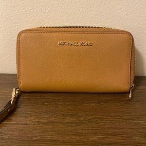 Michael Kors tan wallet.